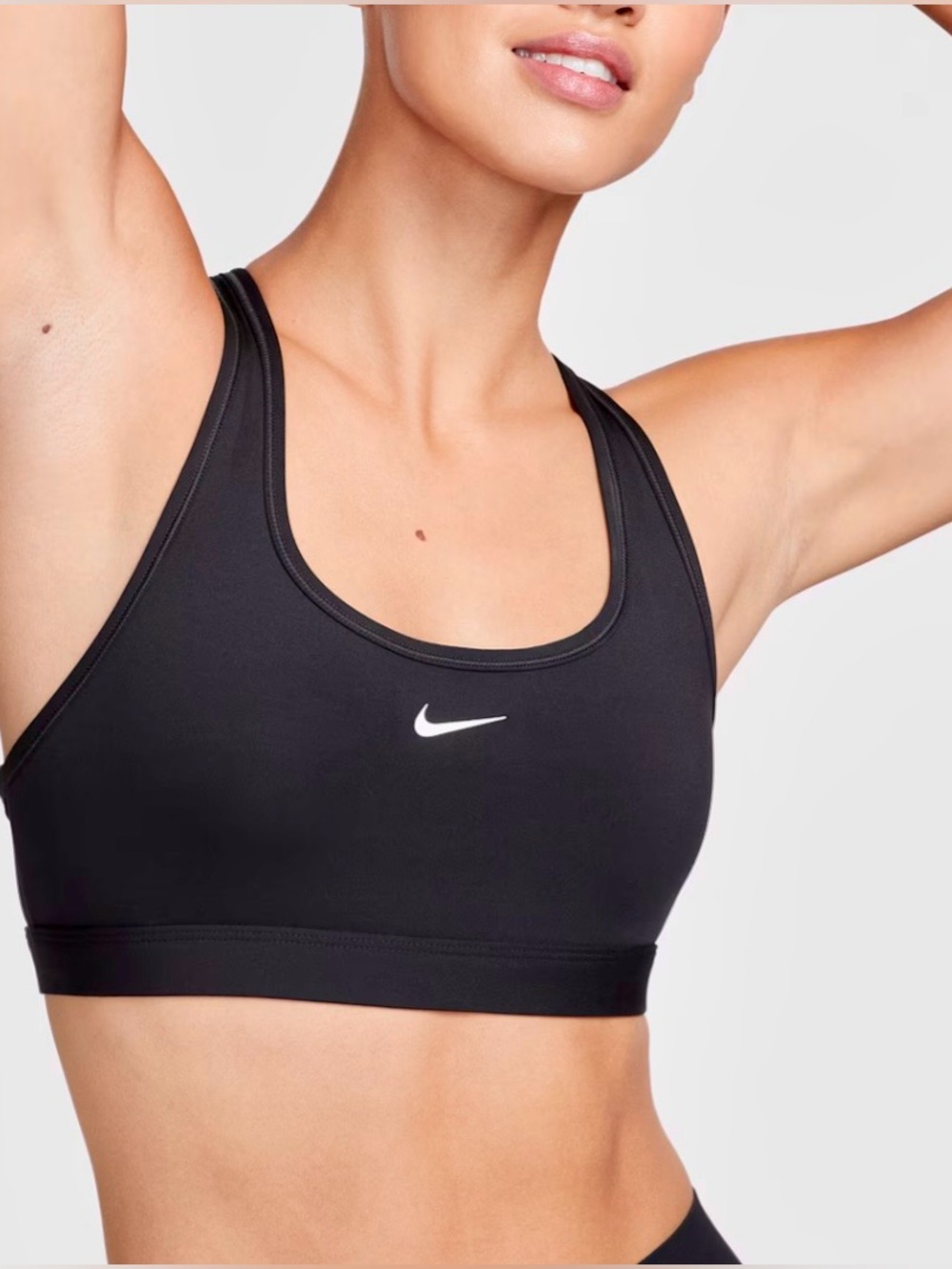 Classic Nike Swoosh Sports Bra in Black with White Swoosh Light Support UnPadded